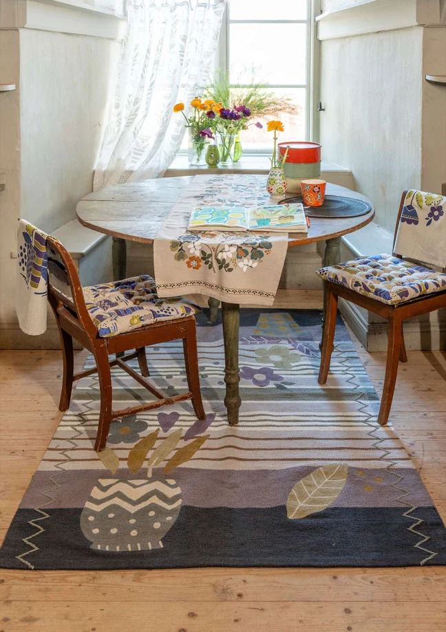 “Flower bed” embroidered organic cotton rug