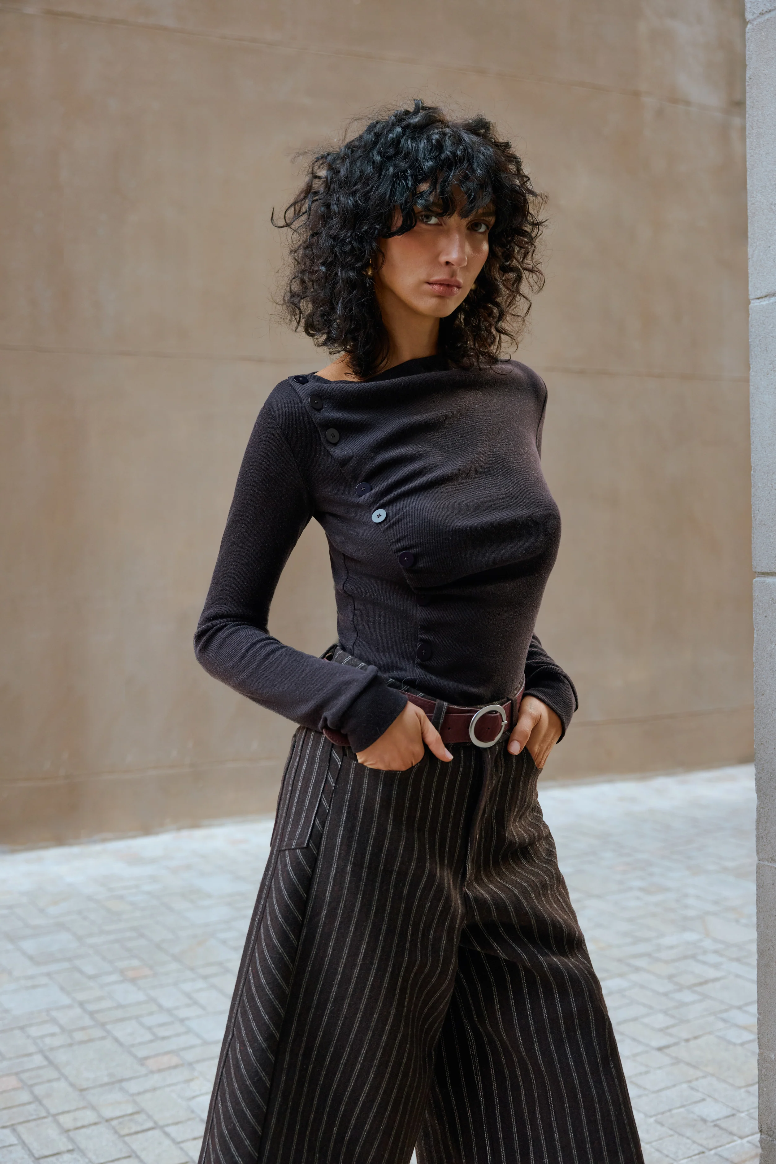 Asymmetrical buttoned top