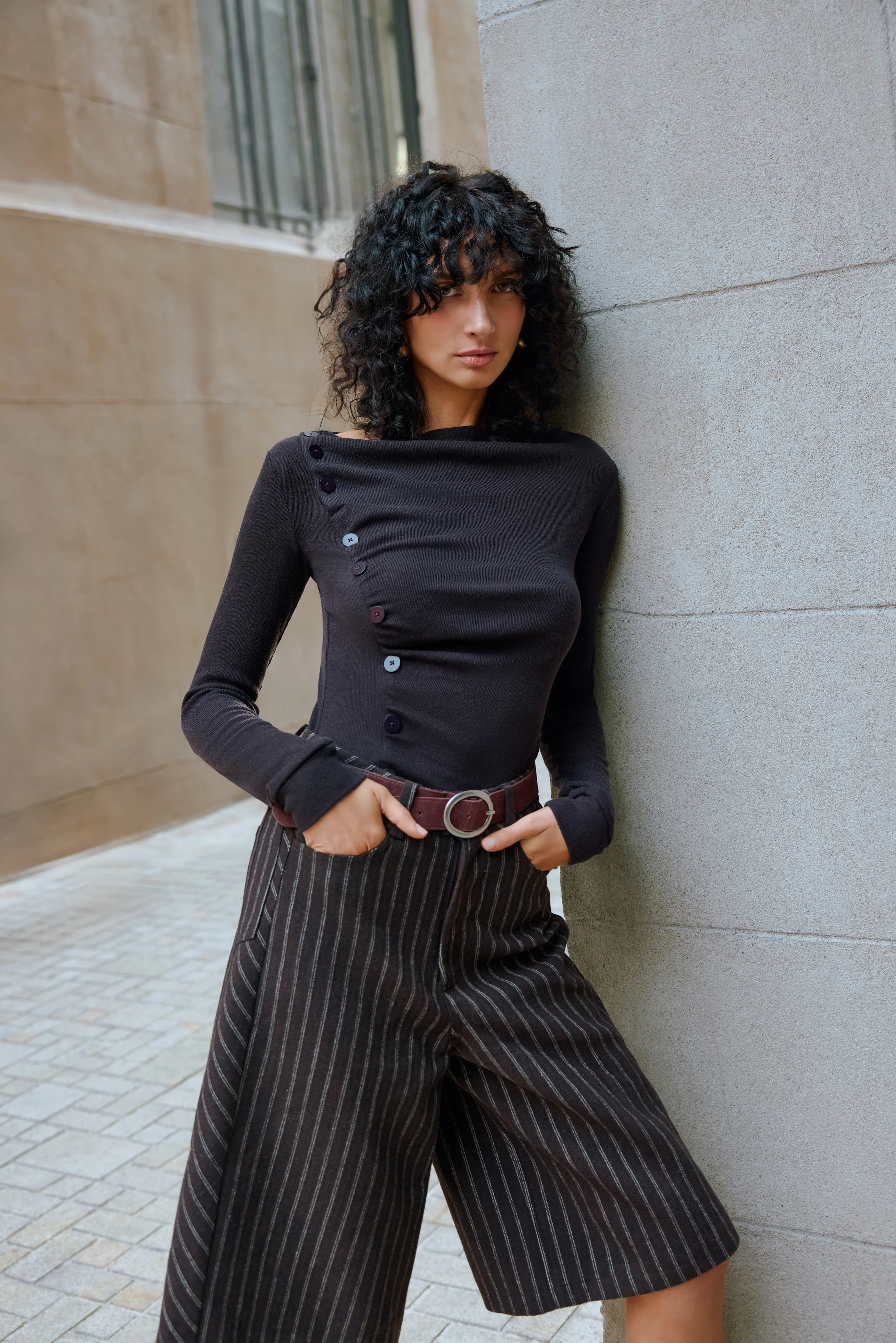 Asymmetrical buttoned top